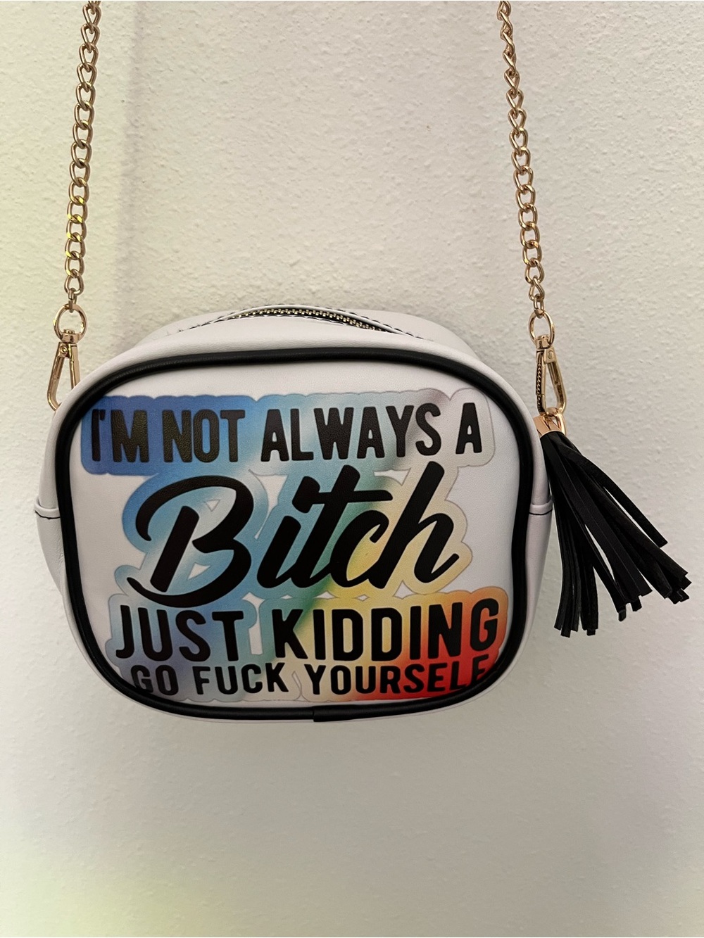 White Crossbody Bag with Colorful Slogan Print and Black Tassel